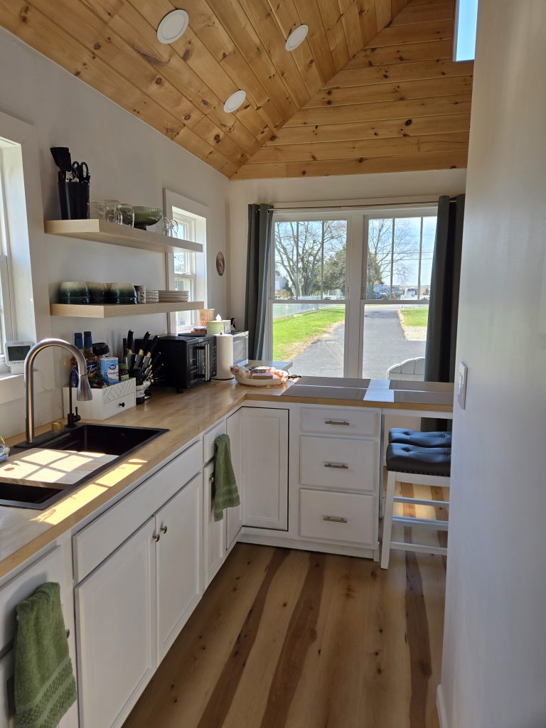 Modern kitchen with wooden accents and natural light
